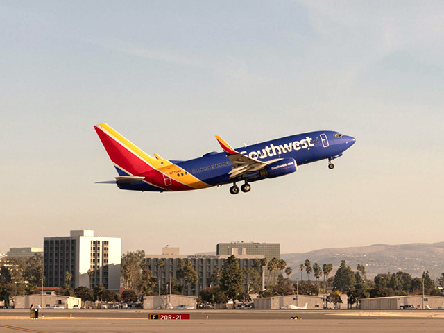 Photo of a Southwest airlines plane taking off.